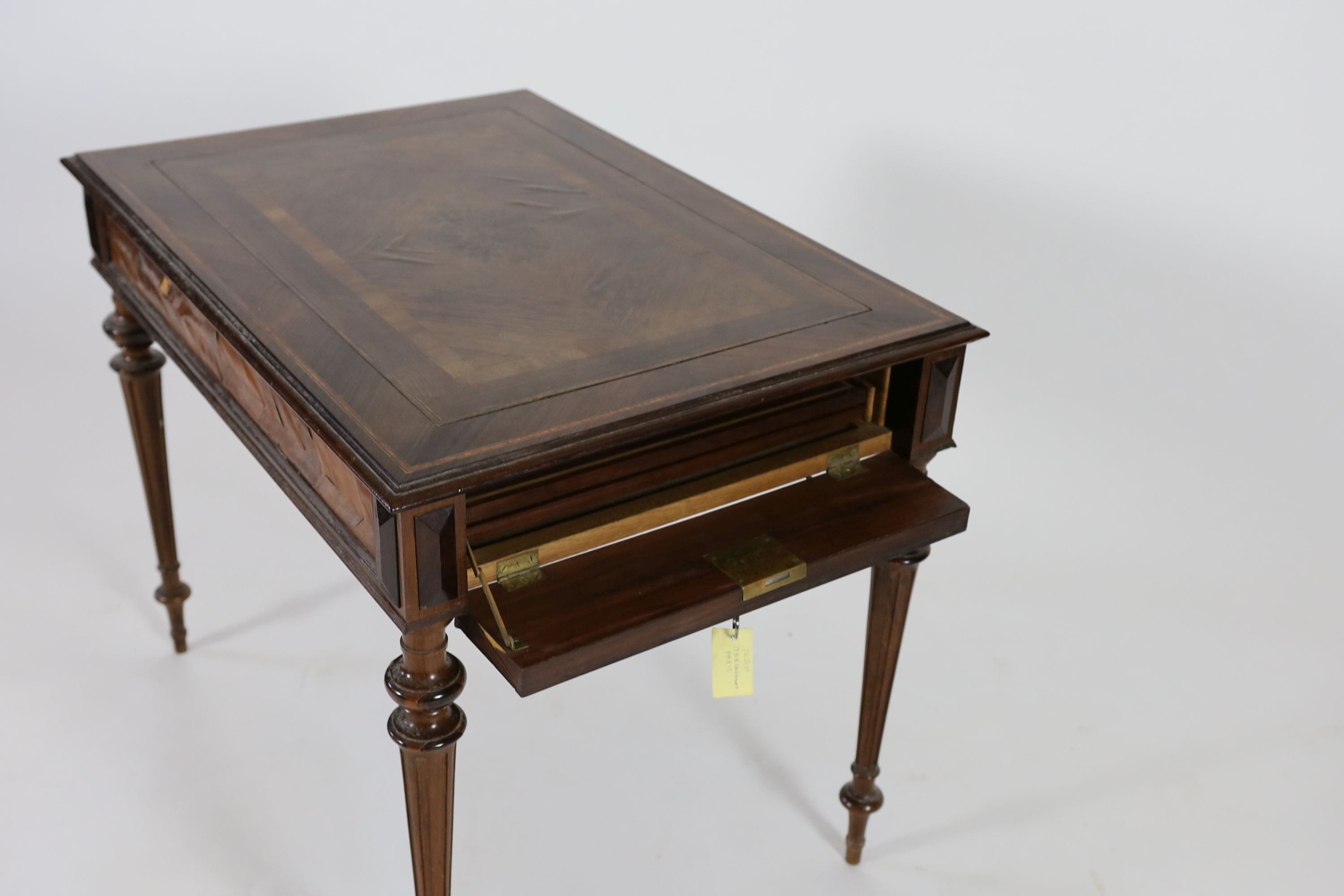 A Napoleon III rosewood games table, by J. A. Jost of Paris, W.92cm D.64cm H.73cm